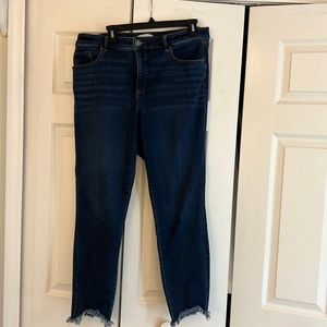 LOFT Curvy Skinny Jeans with ripped bottoms